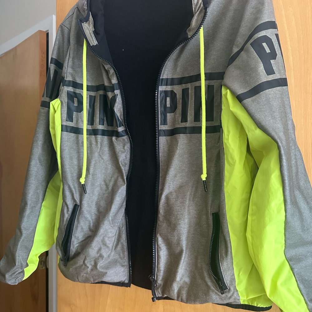 Pink hooded rain jacket
